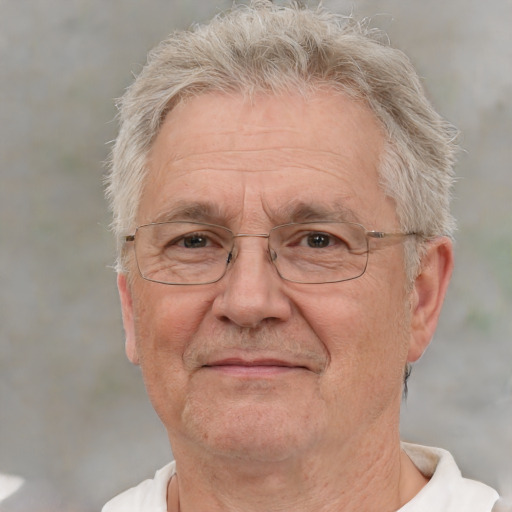 Neutral white middle-aged male with short  gray hair and brown eyes