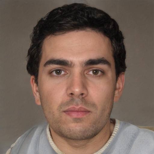 Neutral white young-adult male with short  black hair and brown eyes