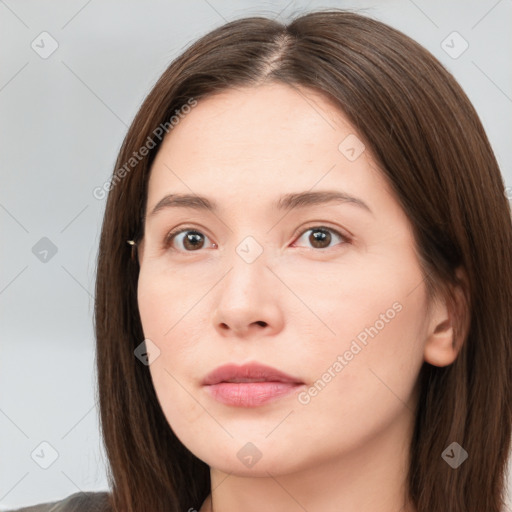 Neutral white young-adult female with long  brown hair and brown eyes