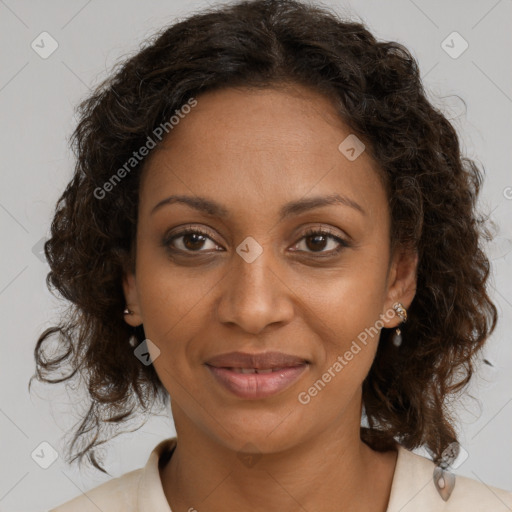 Joyful black young-adult female with medium  brown hair and brown eyes