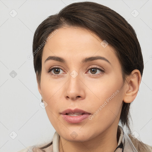 Neutral white young-adult female with medium  brown hair and brown eyes