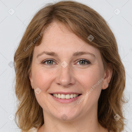 Joyful white young-adult female with medium  brown hair and green eyes