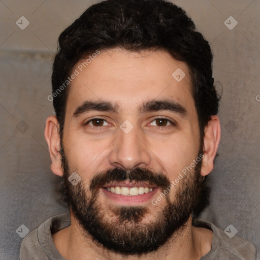 Joyful white young-adult male with short  black hair and brown eyes