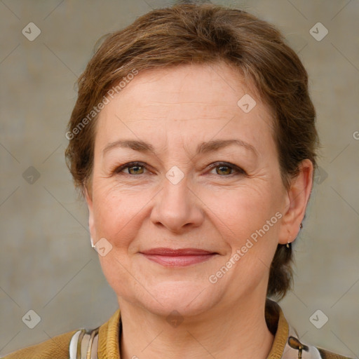 Joyful white adult female with short  brown hair and brown eyes