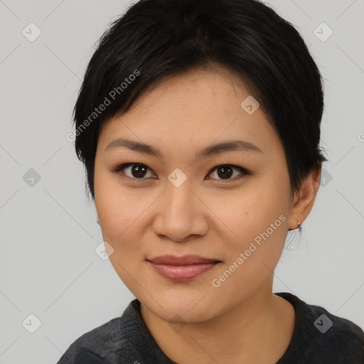 Joyful asian young-adult female with medium  black hair and brown eyes