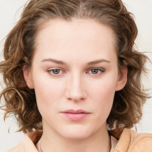 Neutral white young-adult female with medium  brown hair and blue eyes