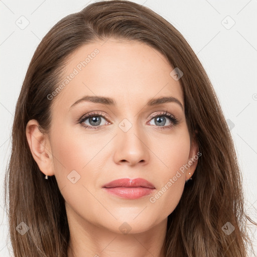 Joyful white young-adult female with long  brown hair and blue eyes