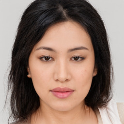 Neutral asian young-adult female with medium  brown hair and brown eyes