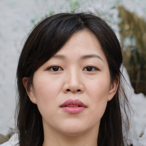 Neutral asian young-adult female with medium  brown hair and brown eyes