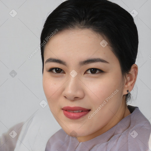 Joyful asian young-adult female with medium  brown hair and brown eyes