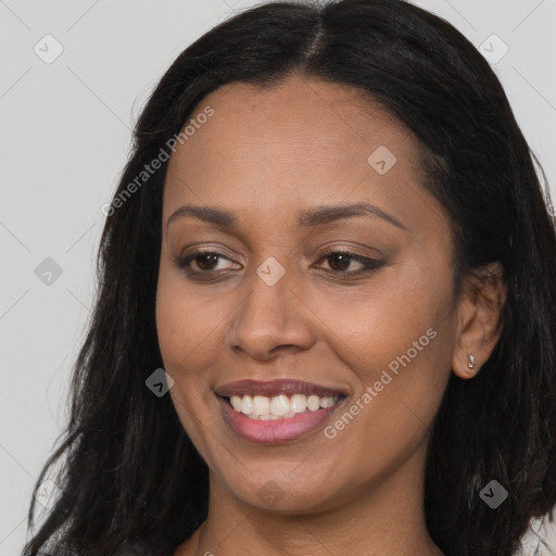 Joyful asian young-adult female with long  brown hair and brown eyes