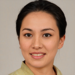 Joyful white young-adult female with medium  brown hair and brown eyes