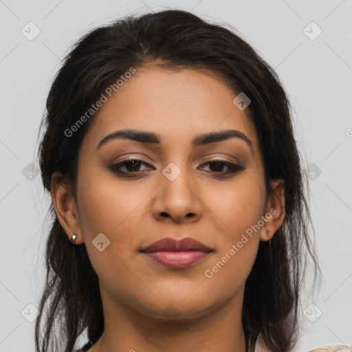 Joyful latino young-adult female with medium  brown hair and brown eyes