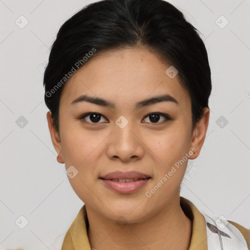 Joyful asian young-adult female with short  black hair and brown eyes