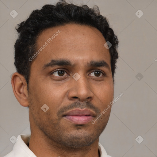 Neutral latino young-adult male with short  brown hair and brown eyes