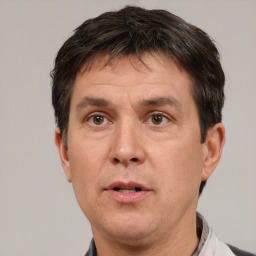 Neutral white adult male with short  brown hair and brown eyes