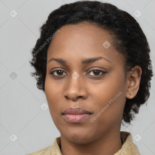 Neutral black young-adult female with short  black hair and brown eyes