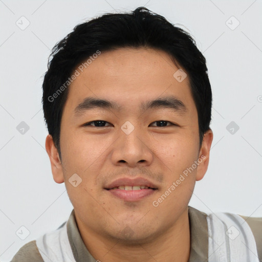 Joyful asian young-adult male with short  black hair and brown eyes