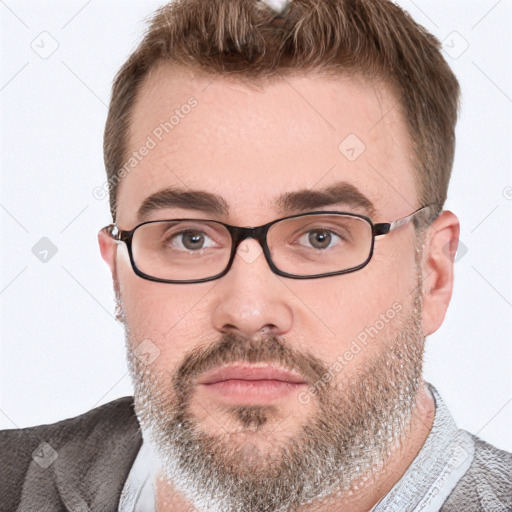 Neutral white adult male with short  brown hair and grey eyes