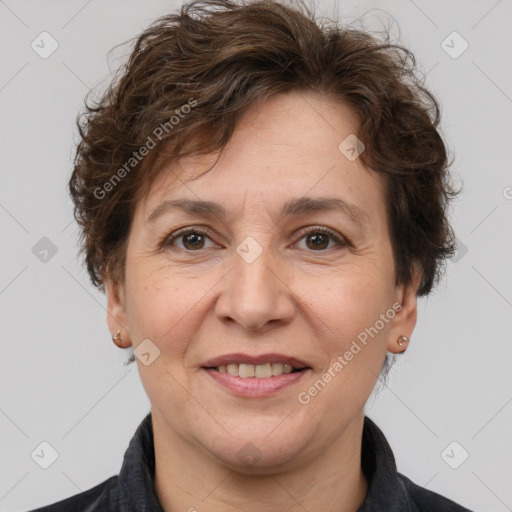 Joyful white adult female with short  brown hair and brown eyes