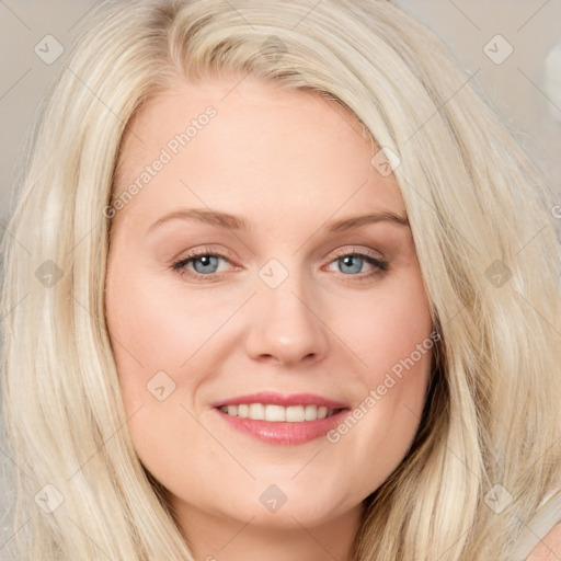 Joyful white young-adult female with long  brown hair and blue eyes