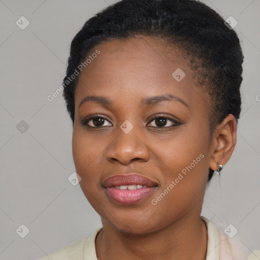 Joyful black young-adult female with short  brown hair and brown eyes