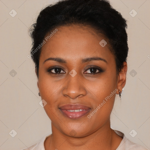 Joyful black young-adult female with short  brown hair and brown eyes