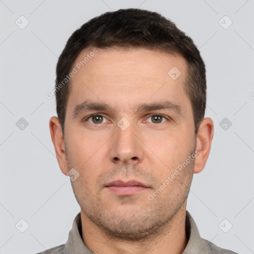 Neutral white young-adult male with short  brown hair and brown eyes