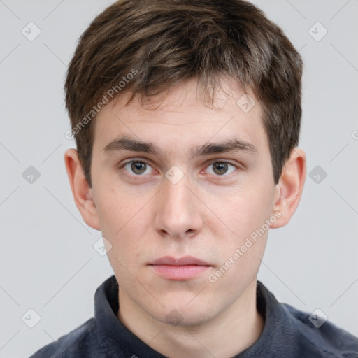 Neutral white young-adult male with short  brown hair and grey eyes