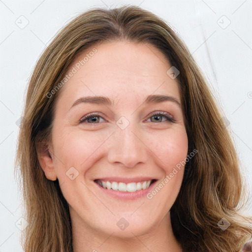 Joyful white young-adult female with long  brown hair and grey eyes