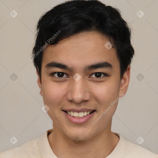 Joyful asian young-adult male with short  black hair and brown eyes