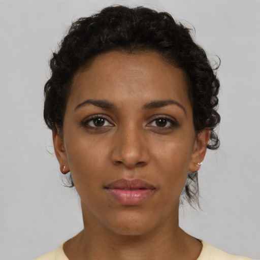 Neutral latino young-adult female with short  brown hair and brown eyes