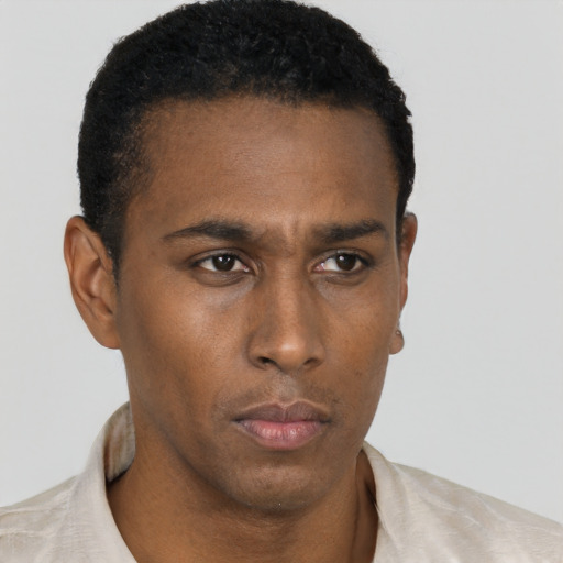 Neutral latino young-adult male with short  brown hair and brown eyes