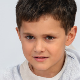 Joyful white child male with short  brown hair and brown eyes