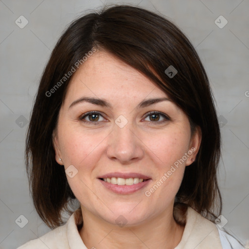 Joyful white adult female with medium  brown hair and brown eyes