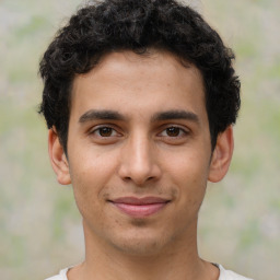 Joyful latino young-adult male with short  brown hair and brown eyes