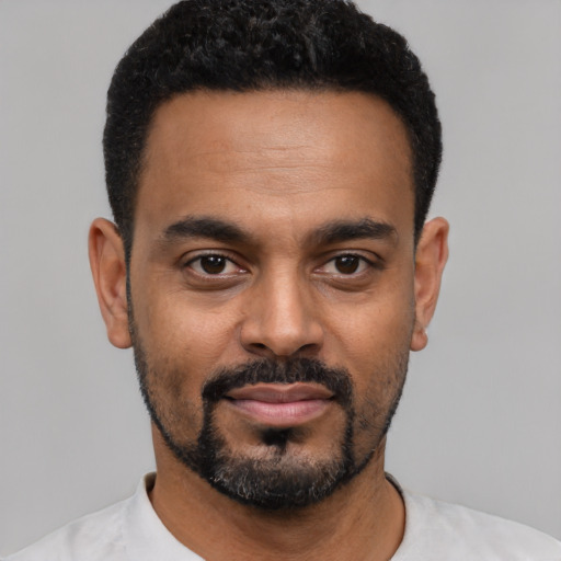 Neutral black young-adult male with short  black hair and brown eyes