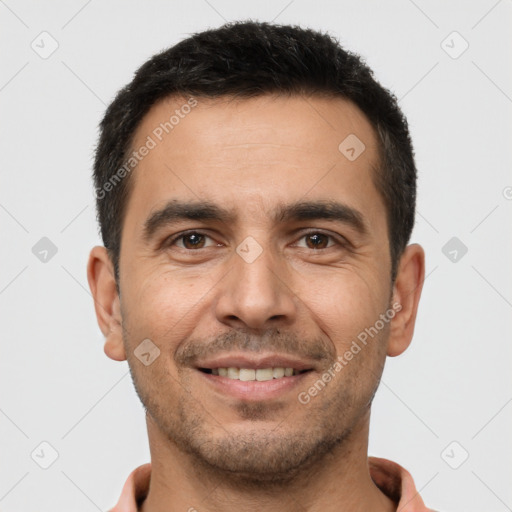 Joyful white young-adult male with short  brown hair and brown eyes