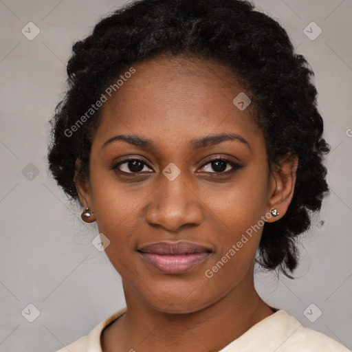 Joyful black young-adult female with long  black hair and brown eyes