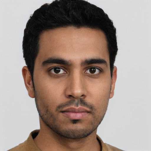 Neutral latino young-adult male with short  black hair and brown eyes