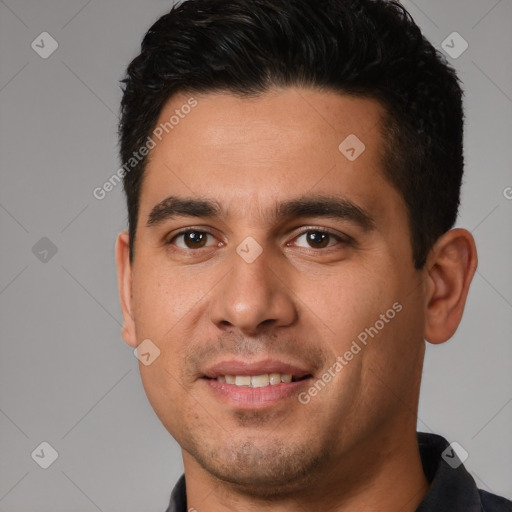 Joyful white young-adult male with short  black hair and brown eyes