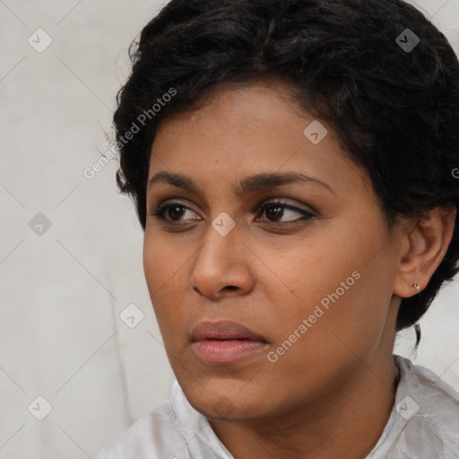 Neutral latino young-adult female with short  brown hair and brown eyes