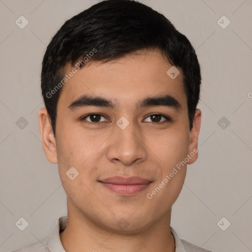 Joyful asian young-adult male with short  black hair and brown eyes