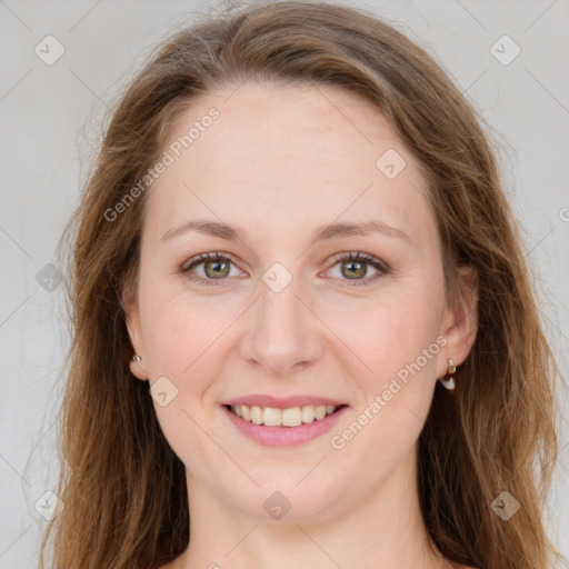 Joyful white young-adult female with long  brown hair and green eyes