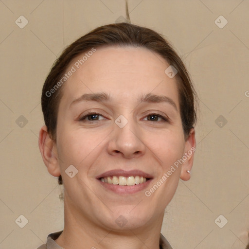 Joyful white adult female with short  brown hair and brown eyes