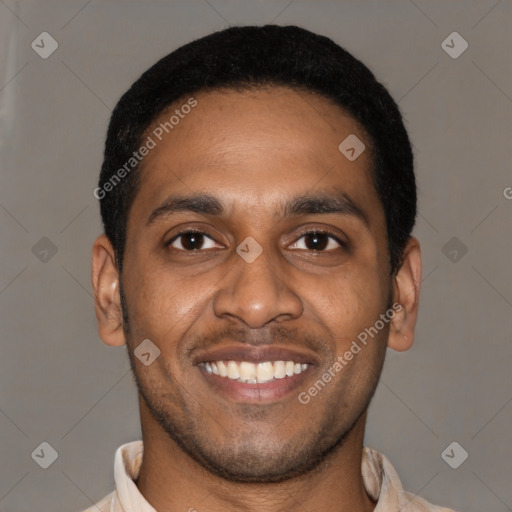 Joyful latino young-adult male with short  black hair and brown eyes