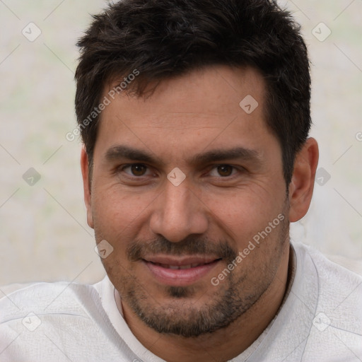 Joyful white adult male with short  brown hair and brown eyes