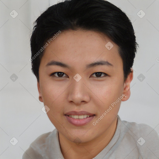 Joyful asian young-adult female with short  black hair and brown eyes