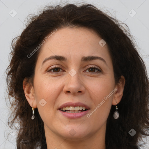 Joyful white adult female with long  brown hair and brown eyes