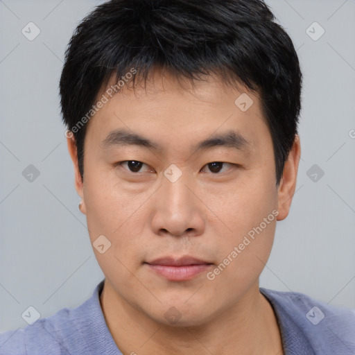 Neutral asian young-adult male with short  brown hair and brown eyes